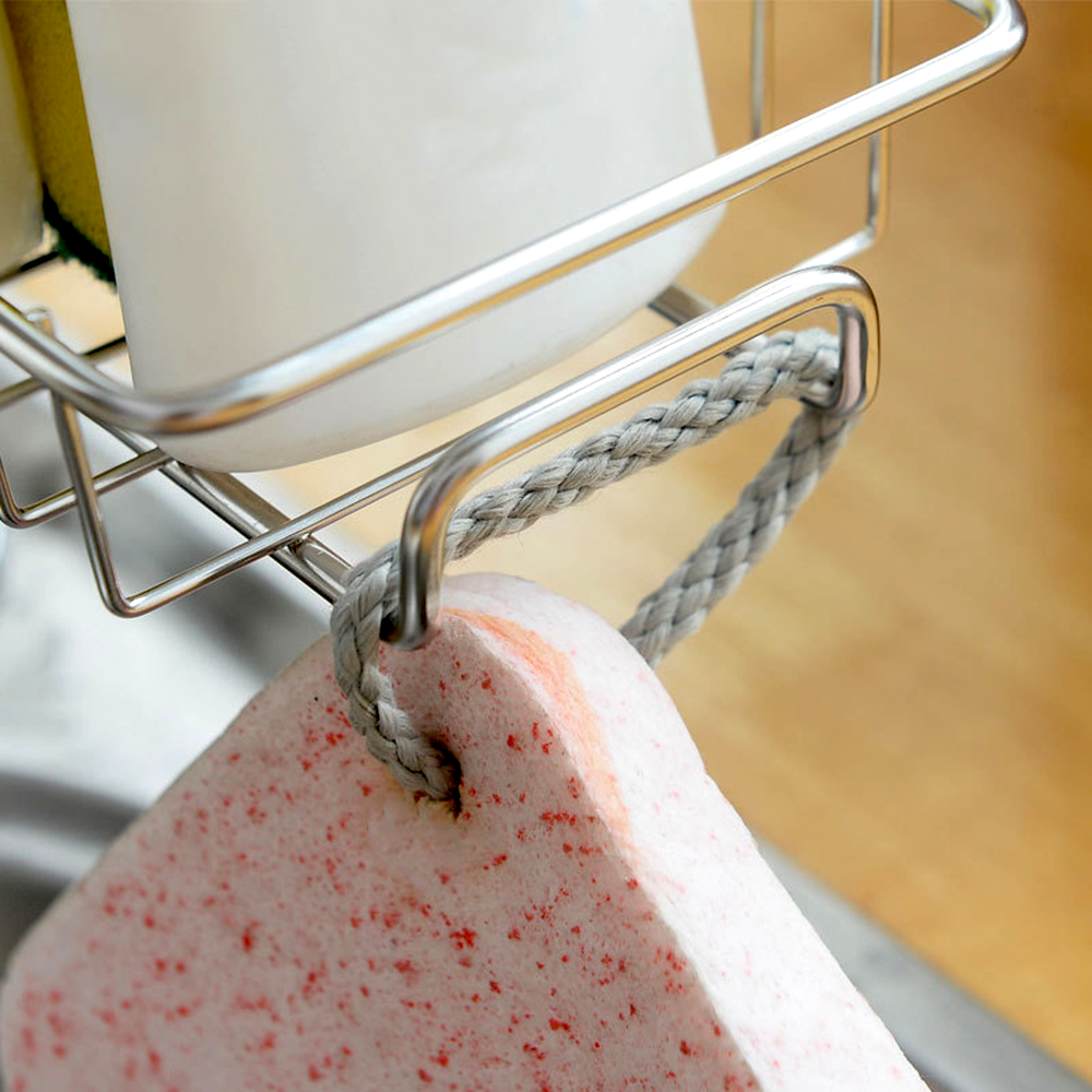 Polička na kohoutek nebo tyč ve sprše